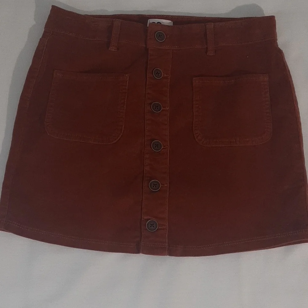 SO Girls Size 16 Corduroy skirt. Burnt‎ Orange, NWOT. Waist sinches to fit.